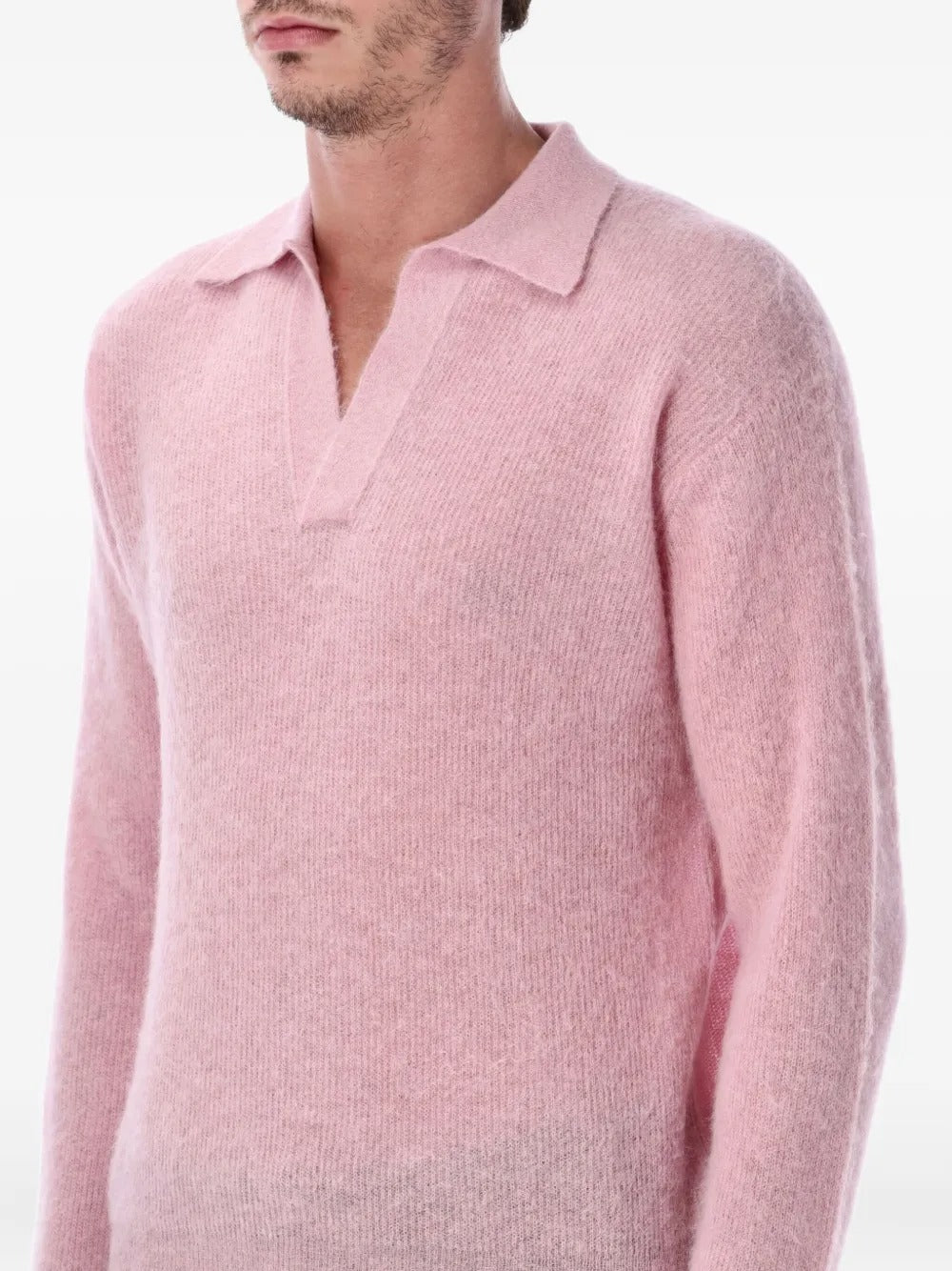 Close up of the pink shirt, showing texture of the alpaca fabric