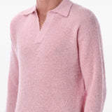 Close up of the pink shirt, showing texture of the alpaca fabric