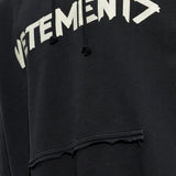 Close up of Black hoodie, showing texture of the 100% cotton fabric