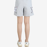 Grey pants worn by a person, showing the pants' fit