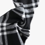 Close up of Black scarf, showing texture of the 100% wool fabric