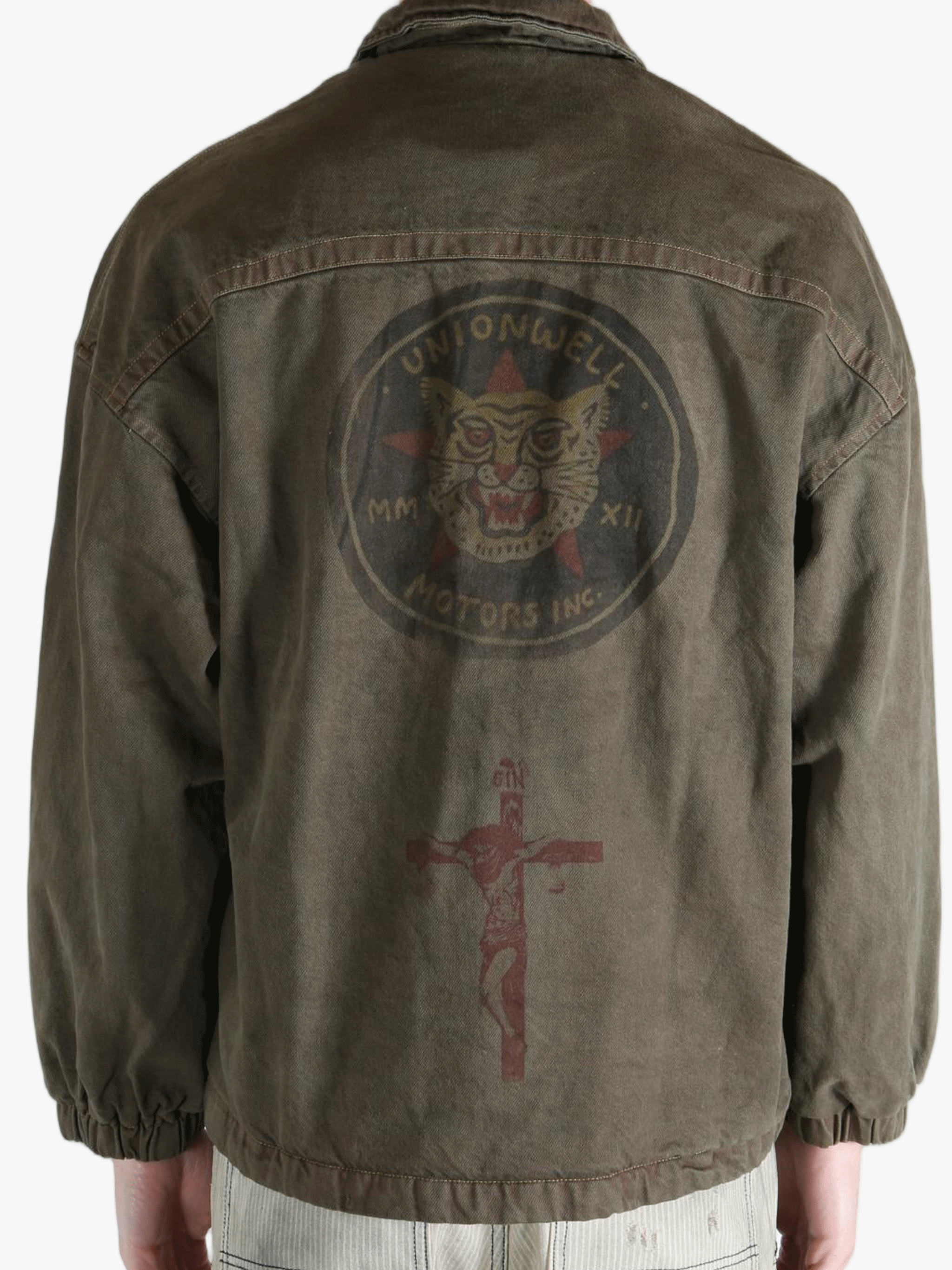 Green jacket worn by a person, showing the jacket's fit