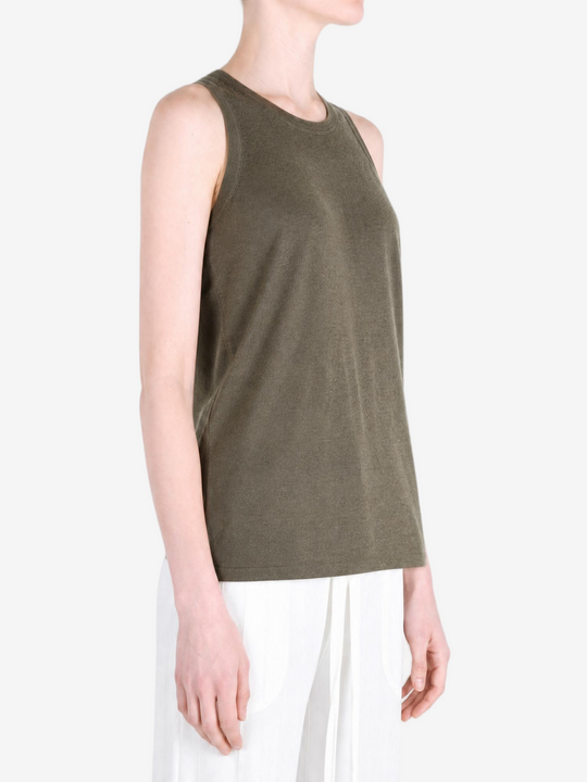Brown top worn by a person, showing the top fit