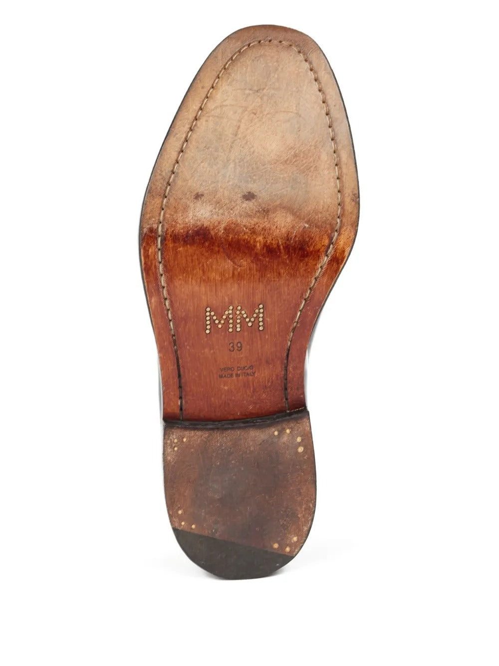 Close up of black shoes, showing texture of the leather fabric