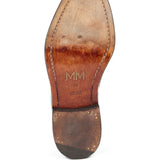 Close up of black shoes, showing texture of the leather fabric