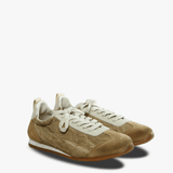 Tan sneakers, side view