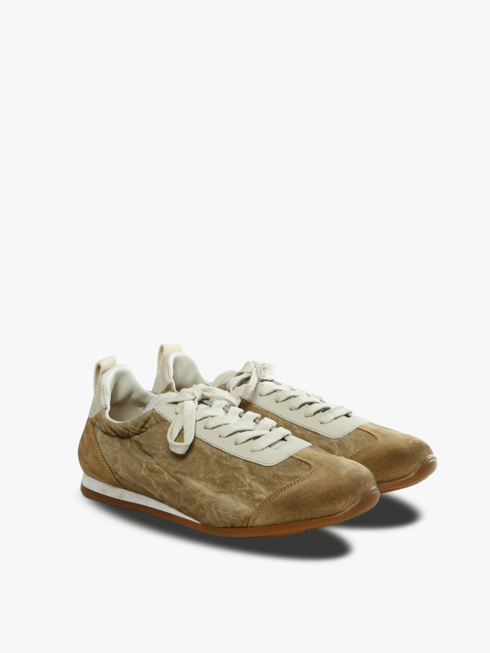 Tan sneakers, side view