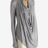 Grey top worn by a person, showing the top's fit