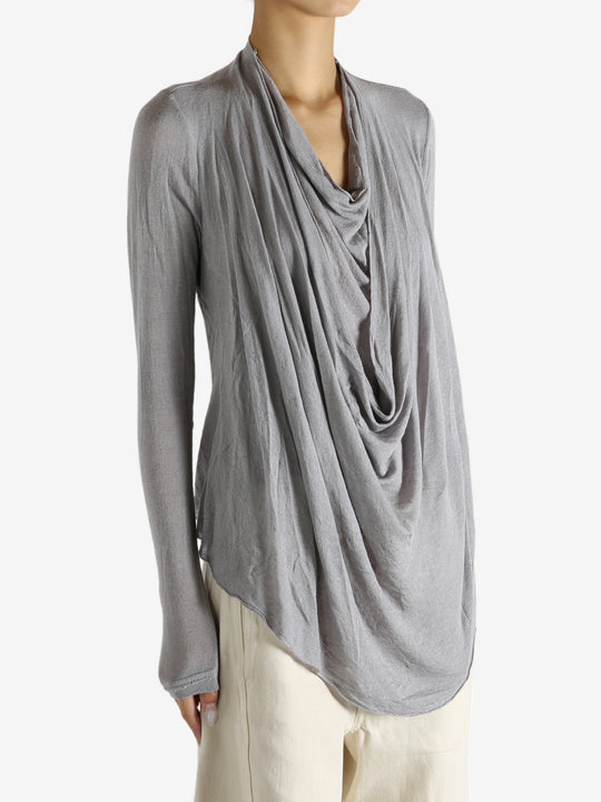 Grey top worn by a person, showing the top's fit