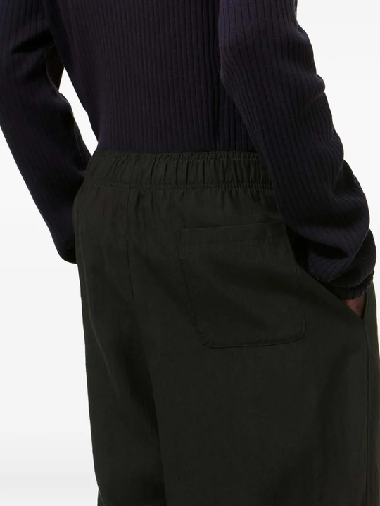 close up of black pants, showing texture of the linen fabric
