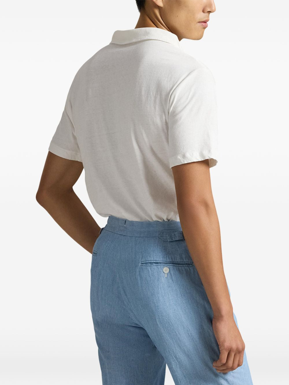 Blue t-shirt worn by a person, showing the t-shirt fit