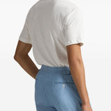 Blue t-shirt worn by a person, showing the t-shirt fit