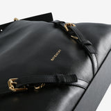 Close up of the black bag, showing texture of the calf leather fabric