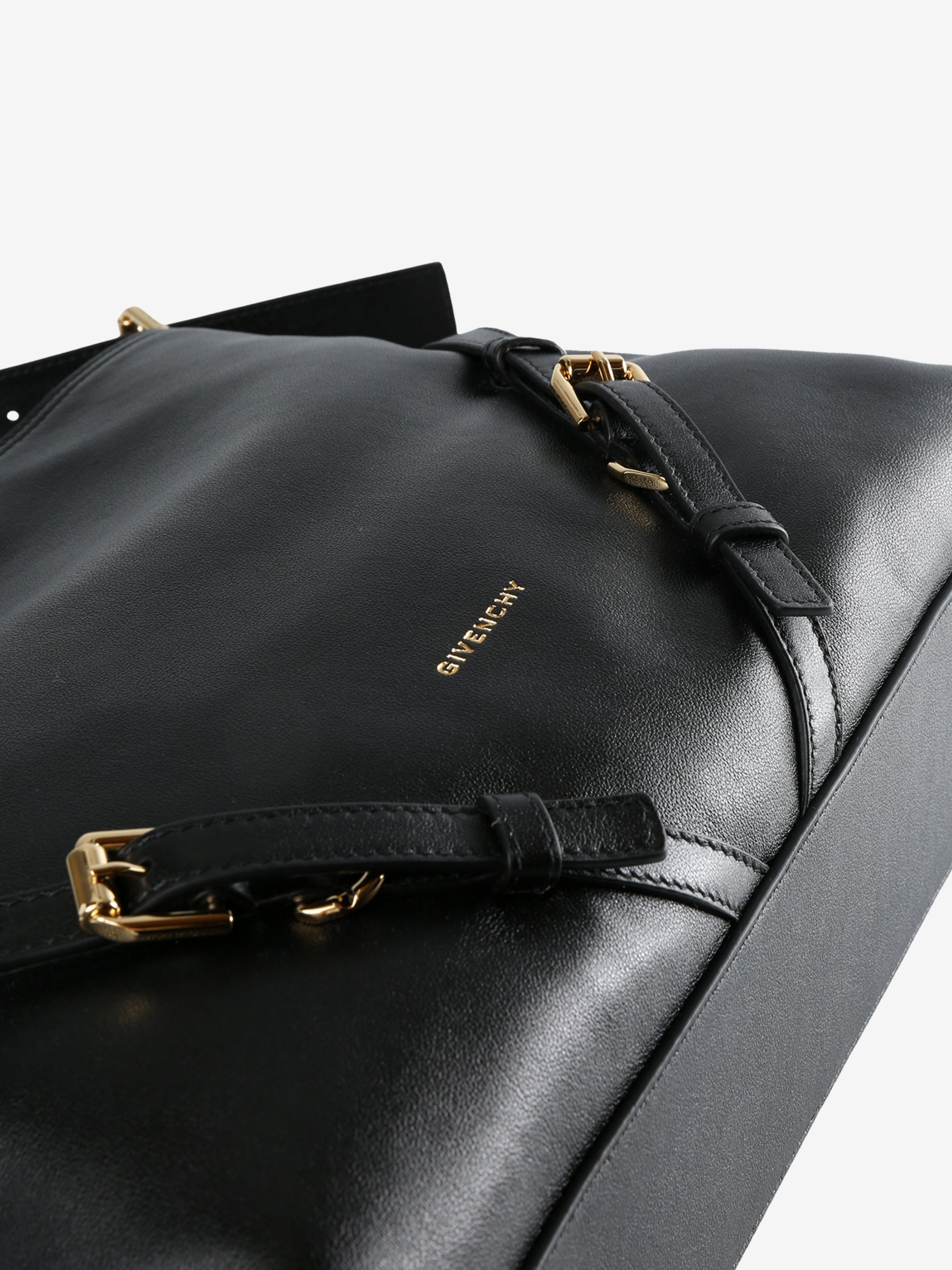 Close up of the black bag, showing texture of the calf leather fabric
