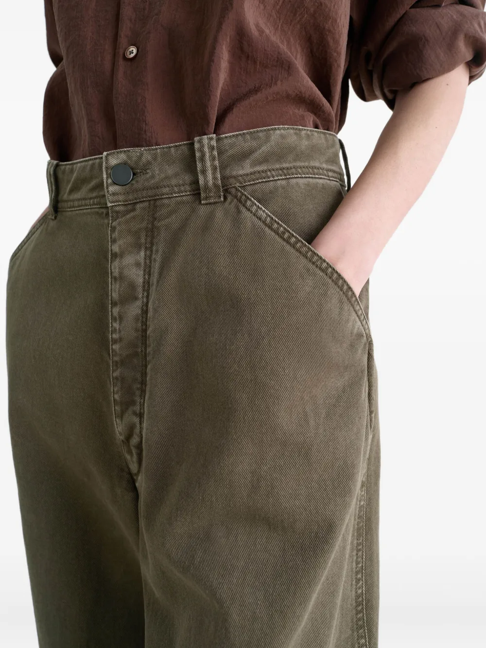 Close up of Brown pants, showing texture of the cotton fabric