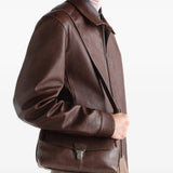 Brown bag worn by a person, showing the bag fit