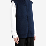 Navy jacket worn by a person, showing the jacket fit