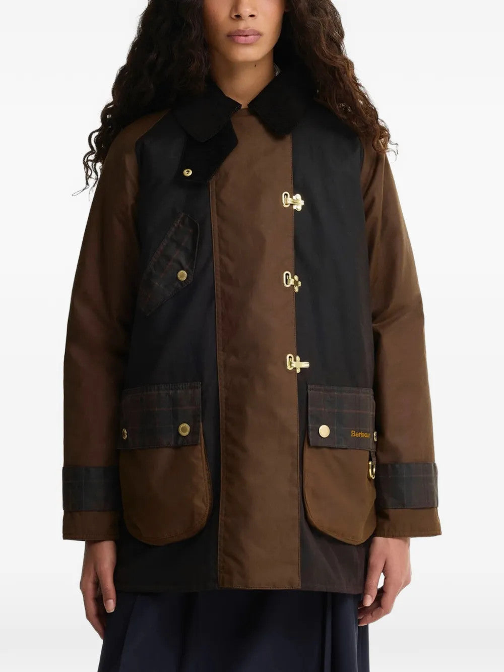 Brown jacket worn by a person, showing the jacket fit
