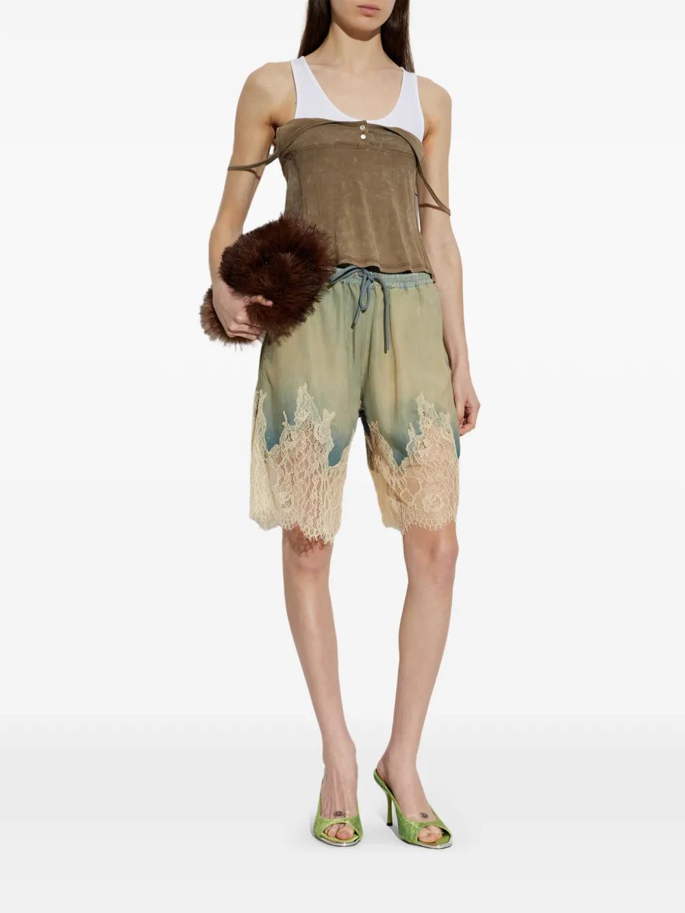 Brown top worn by a person, showing the top's fit