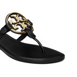 Close up of black sandal , showing texture of the Calf Leather and Rubber fabric