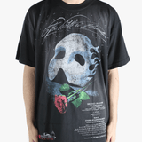 Black t-shirts worn by a person, showing the t-shirts fit