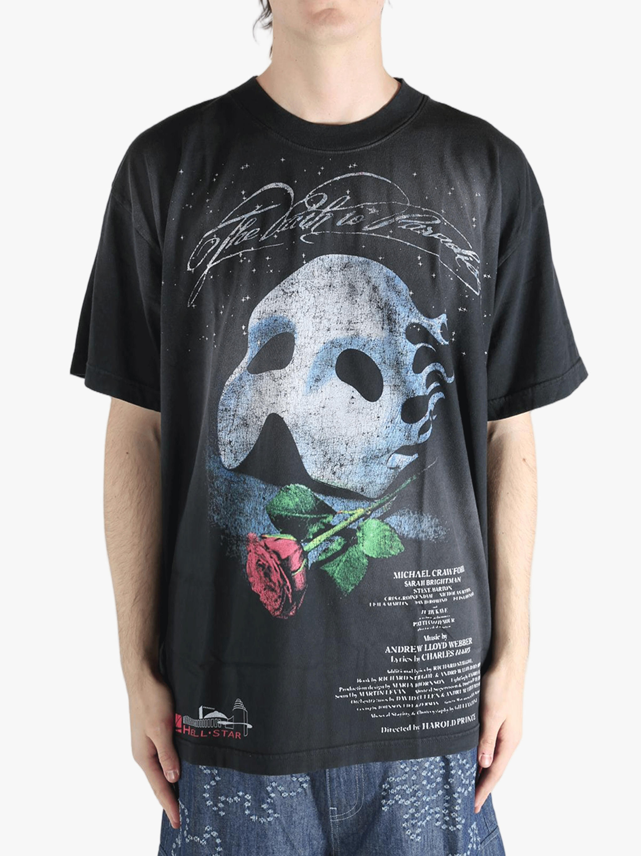 Black t-shirts worn by a person, showing the t-shirts fit