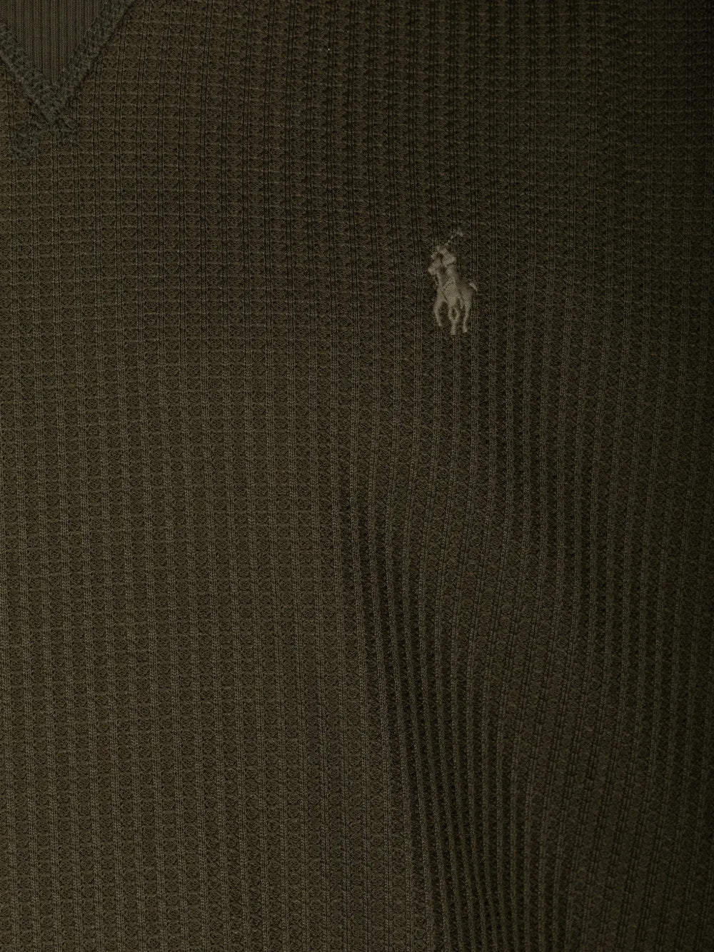 Close up of Green hoodie, showing texture of the 80% polyester/ 18% cotton/ 2% elastane fabric