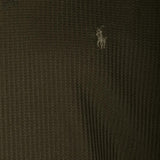 Close up of Green hoodie, showing texture of the 80% polyester/ 18% cotton/ 2% elastane fabric