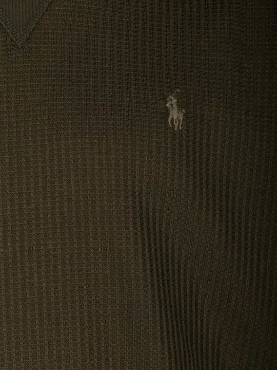Close up of Green hoodie, showing texture of the 80% polyester/ 18% cotton/ 2% elastane fabric