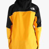 Yellow jacket worn by a person, showing the jacket's fit