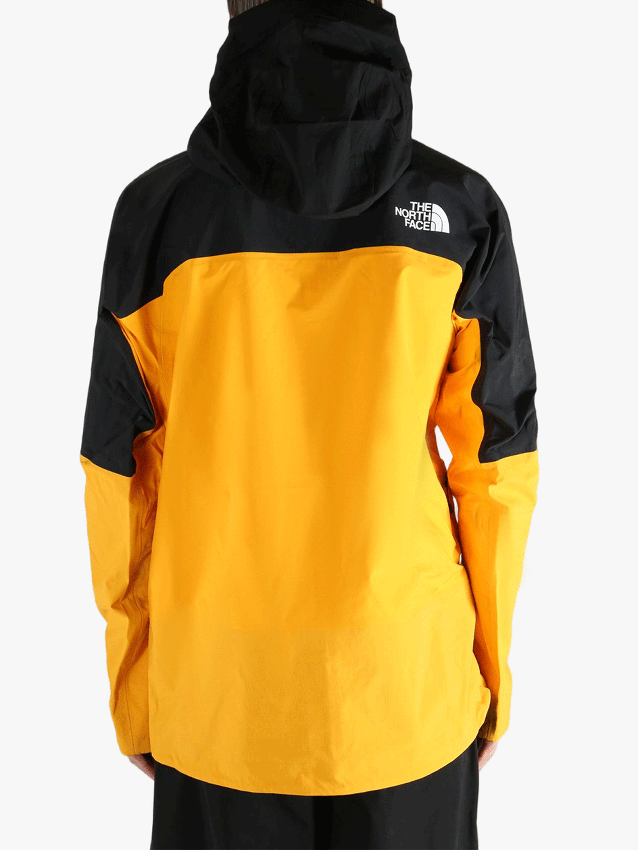 Yellow jacket worn by a person, showing the jacket's fit