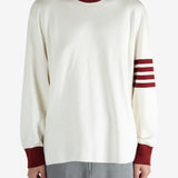 Tan shirts worn by a person, showing the shirts  fit