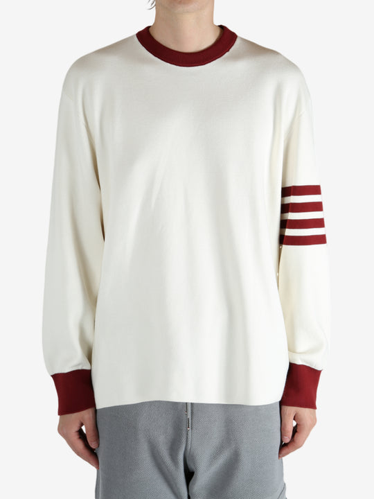 Tan shirts worn by a person, showing the shirts  fit