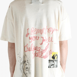 White t-shirt worn by a person, showing the shirt's fit