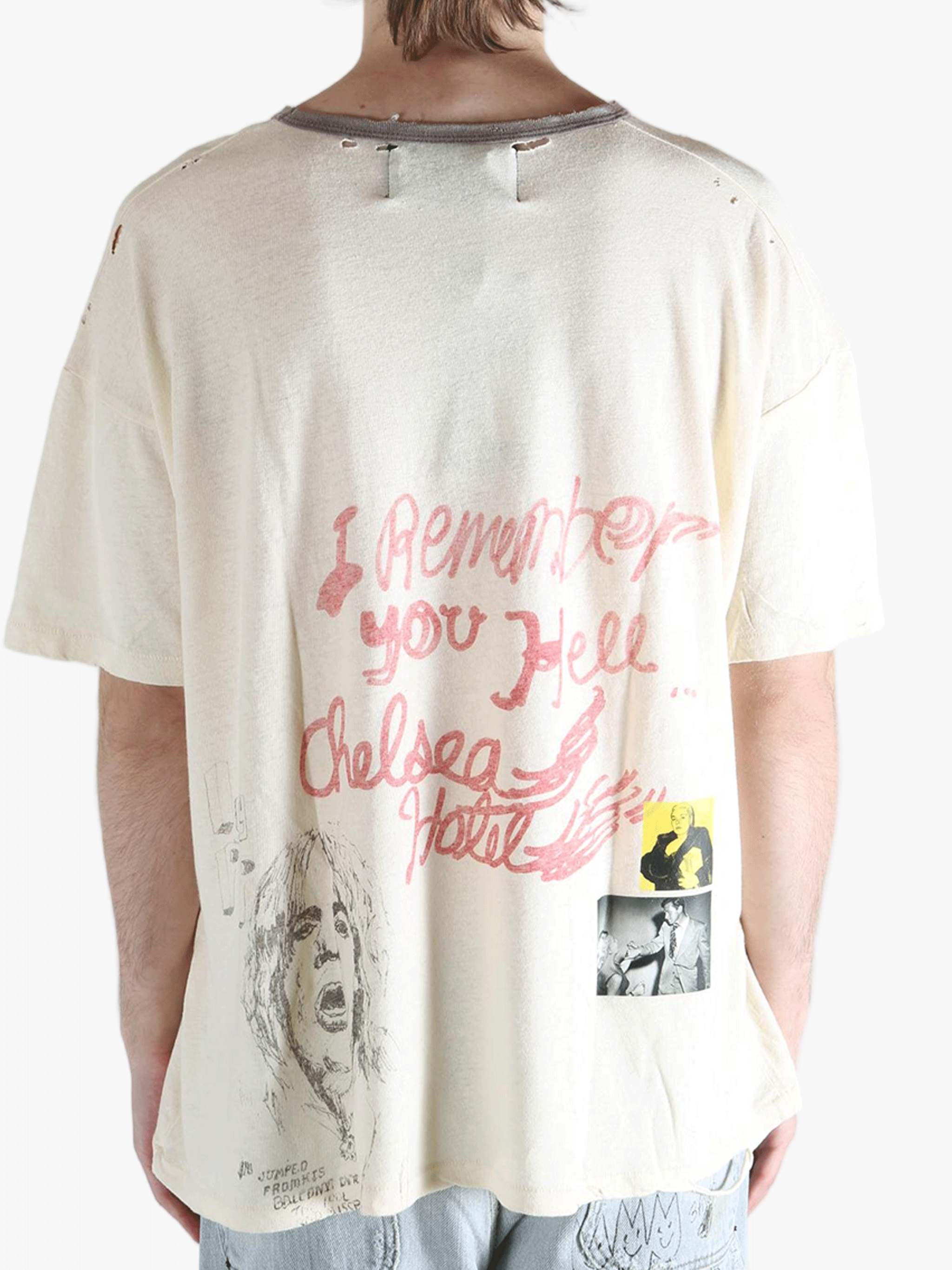 White t-shirt worn by a person, showing the shirt's fit