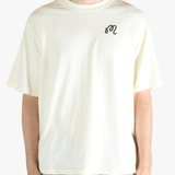 White t-shirt worn by a person, showing the shirt's fit