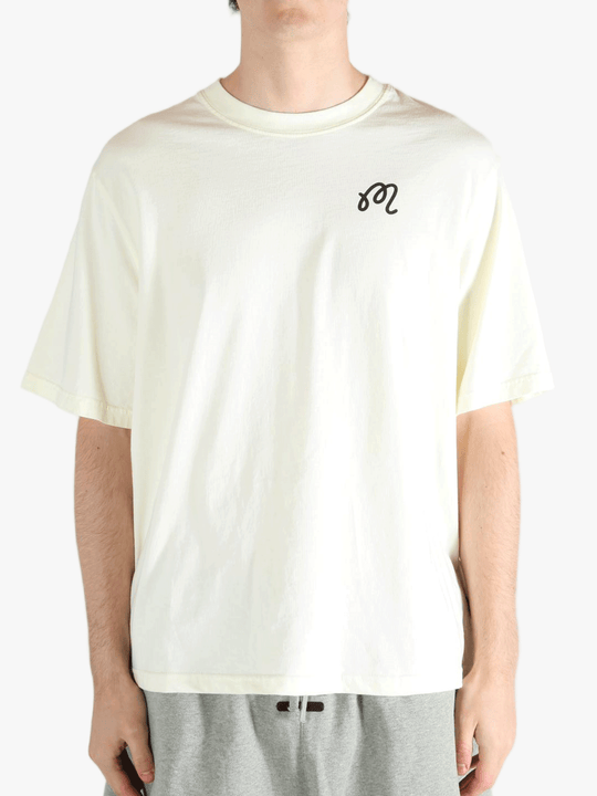 White t-shirt worn by a person, showing the shirt's fit