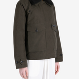Brown jacket worn by a person, showing the jacket fit