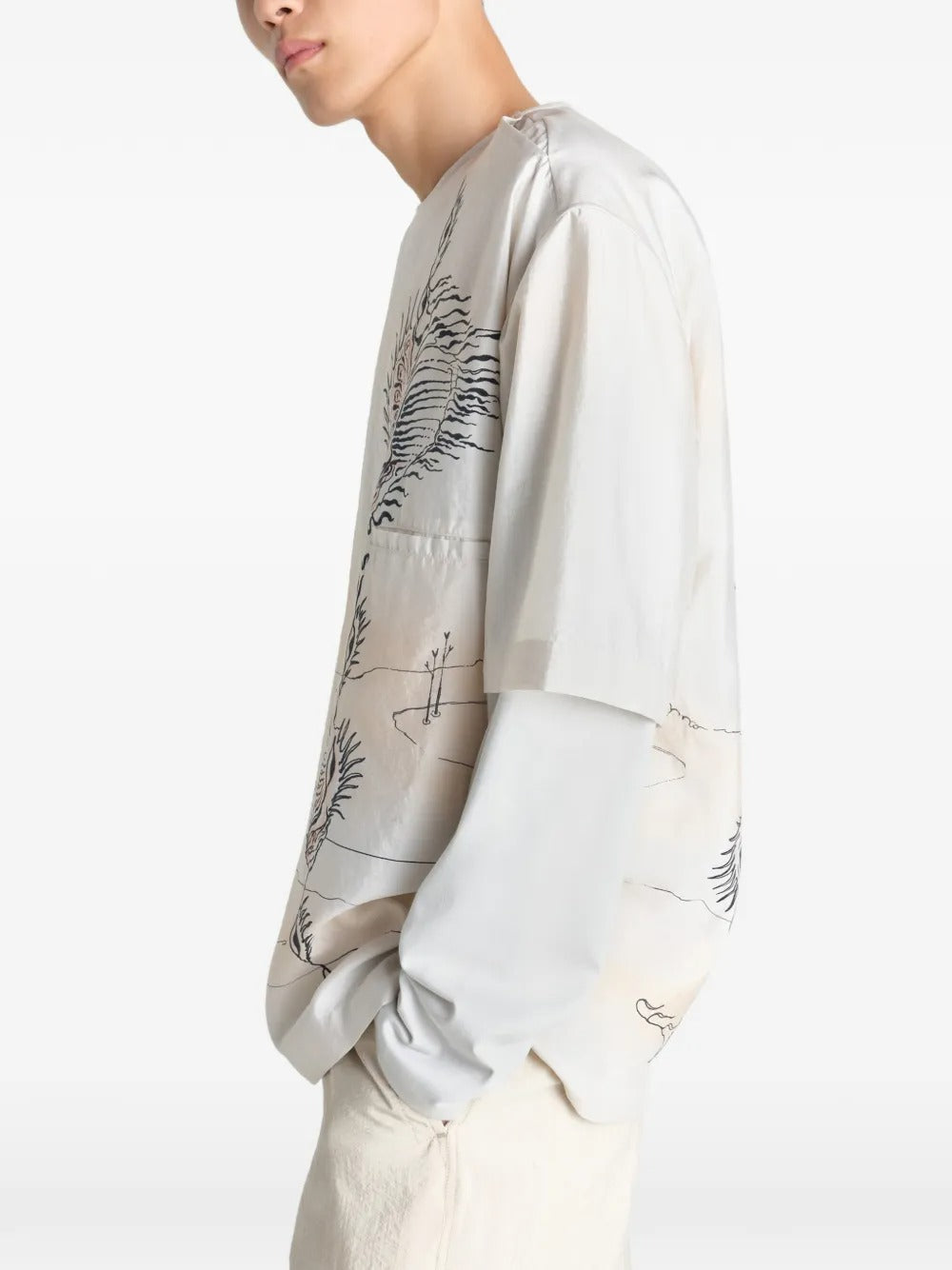 White tops worn by a person, showing the tops fit