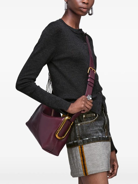 Red bag worn by a person, showing the bag fit