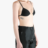 Black activewear worn by a person, showing the activewear's fit