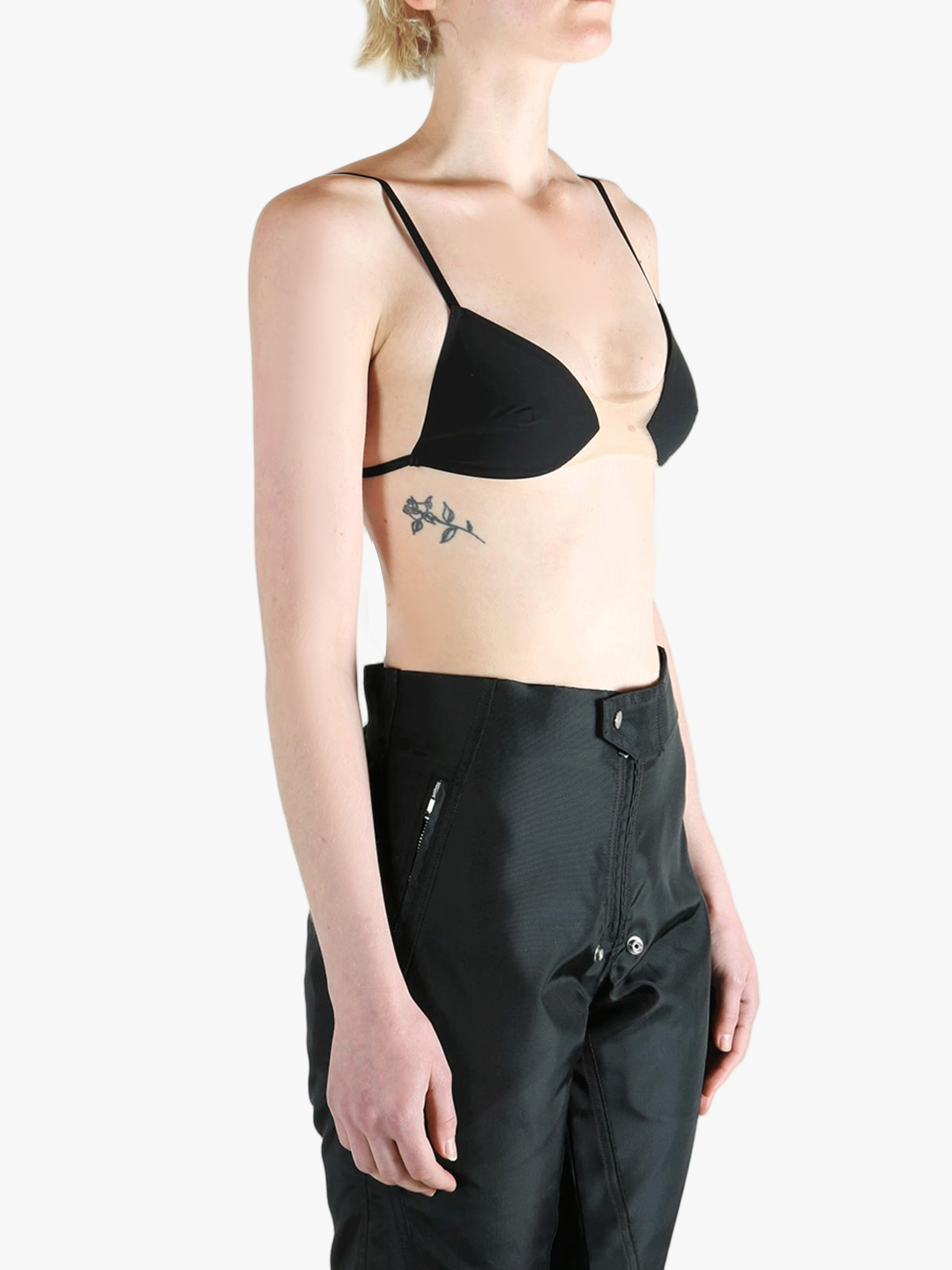 Black activewear worn by a person, showing the activewear's fit