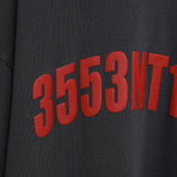 Close up of the grey t-shirt, showing texture of the cotton fabric