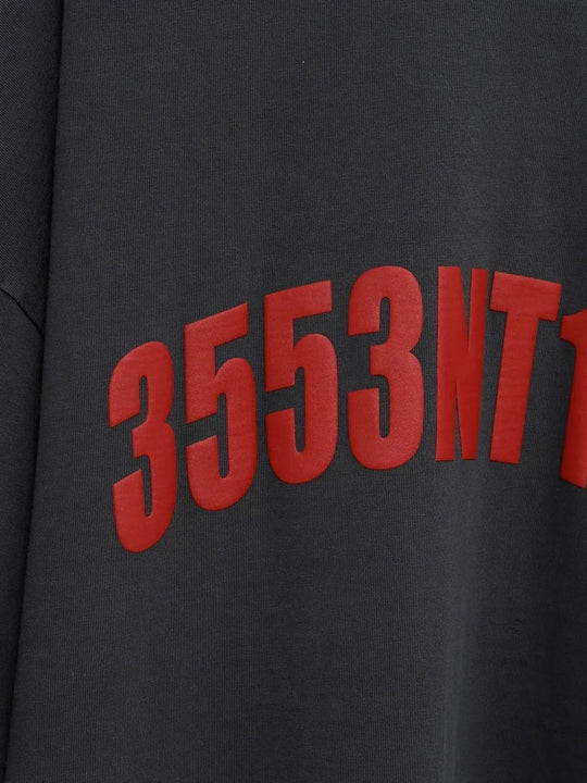 Close up of the grey t-shirt, showing texture of the cotton fabric