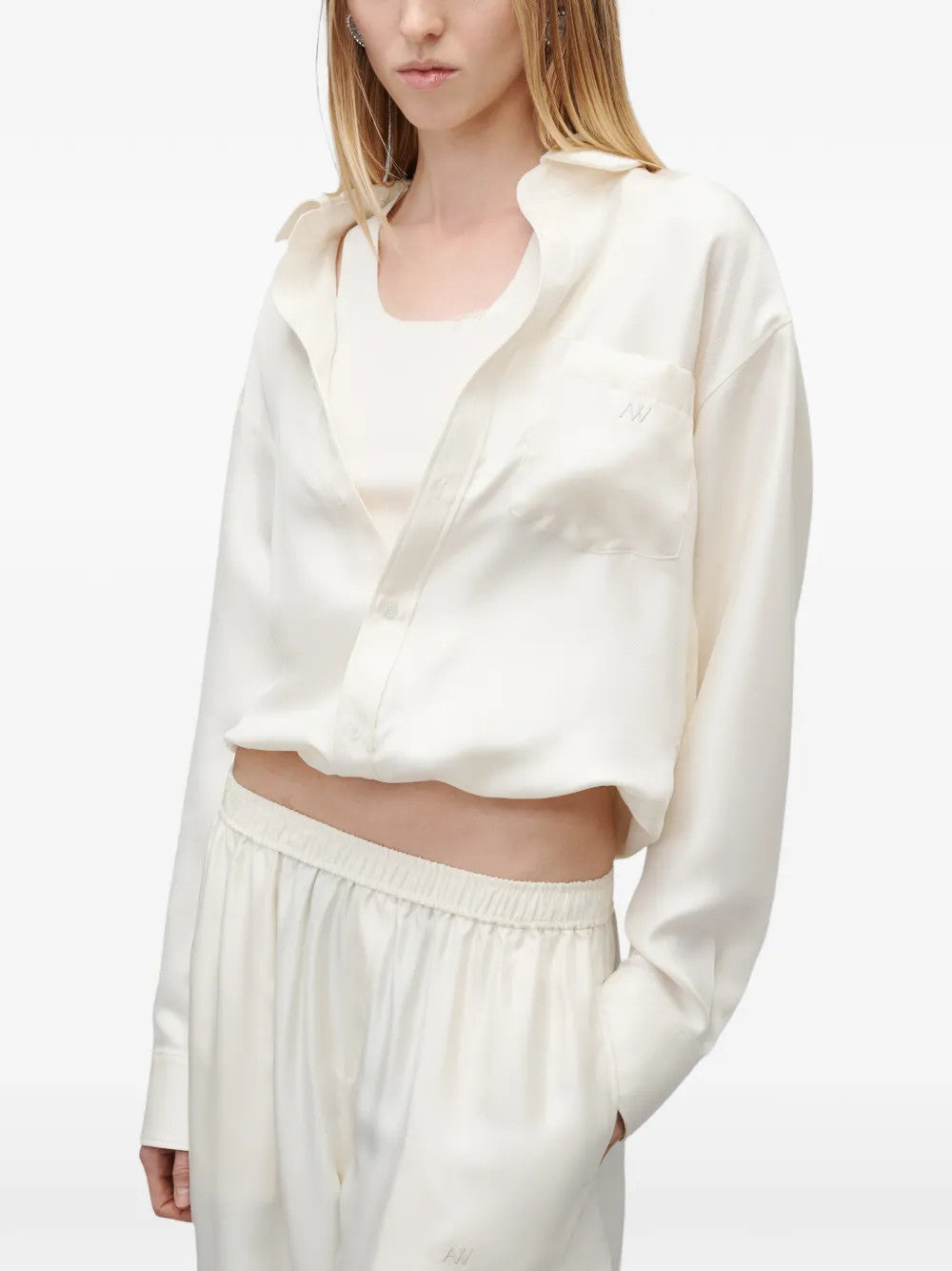 Tan top worn by a person, showing the top fit