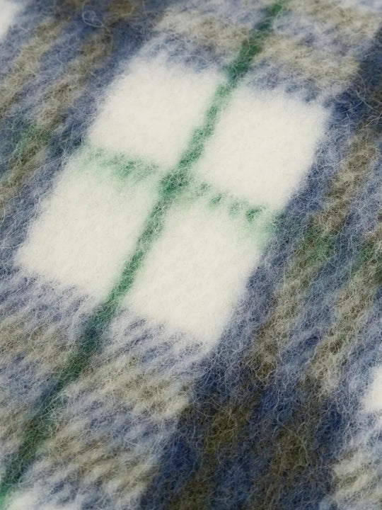 Close up of Blue scarf, showing texture of the 79% wool/ 21% polyamide fabric