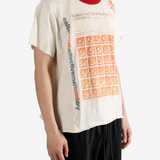 Tan t-shirt worn by a person, showing the t-shirt fit