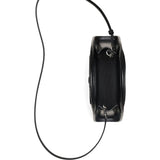 Close up of the black bag, showing texture of the leather fabric