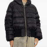 Black jacket worn by a person, showing the jacket fit