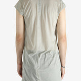 White t-shirt worn by a person, showing the shirt's fit